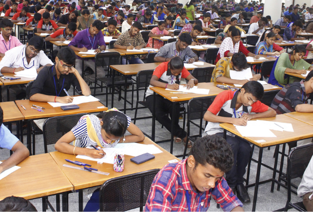 students giving exams in the exam hall